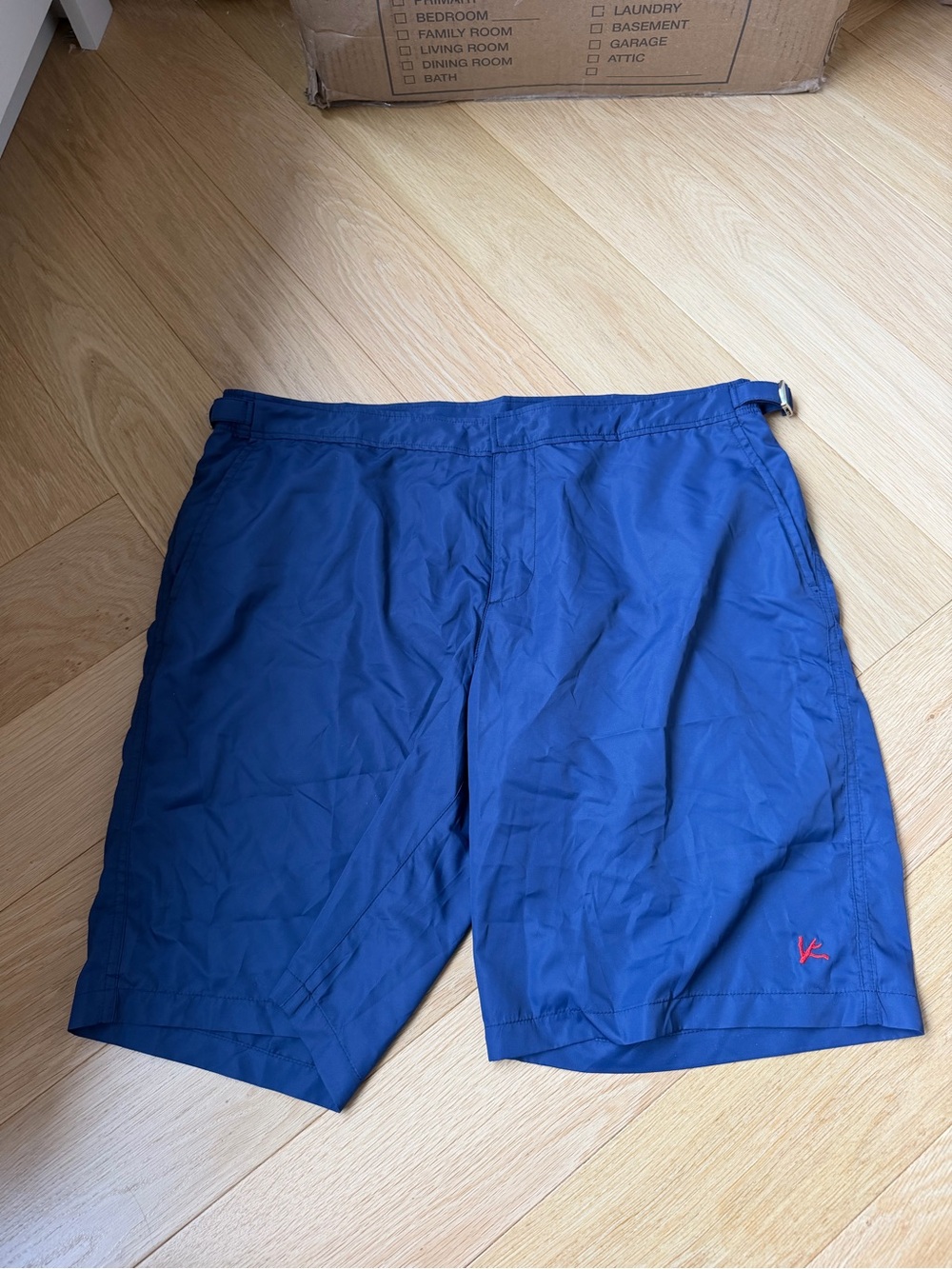 Never been worn isaia Blue Swim Shorts with Subtle Red Logo